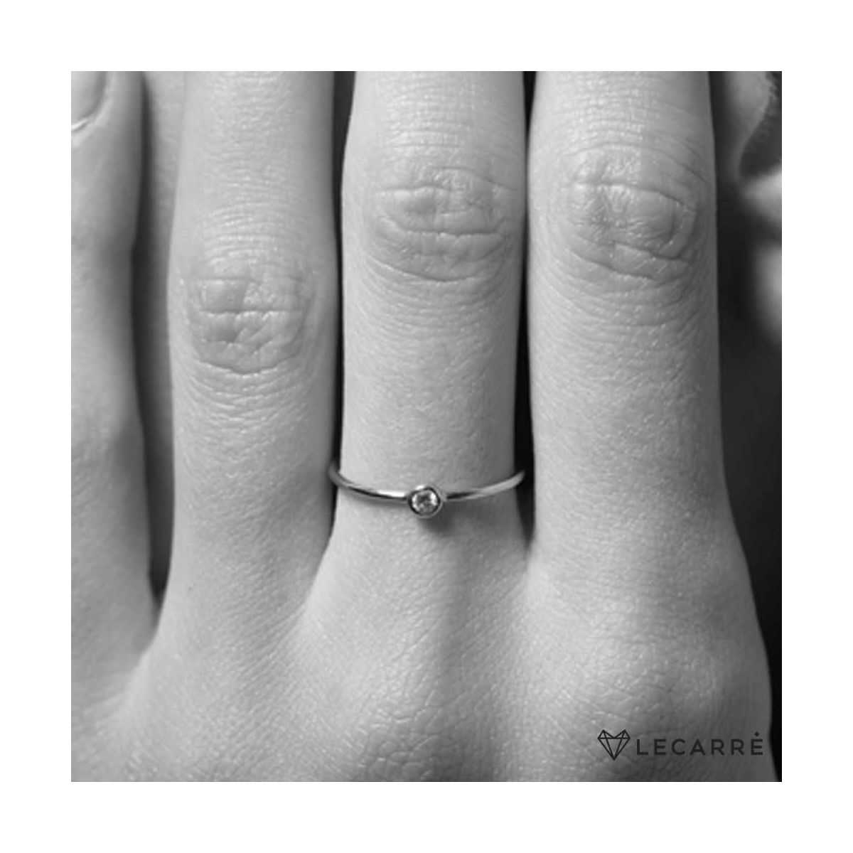 mano Solitario oro blanco y diamante de 0.05 cts - GA014OB.13